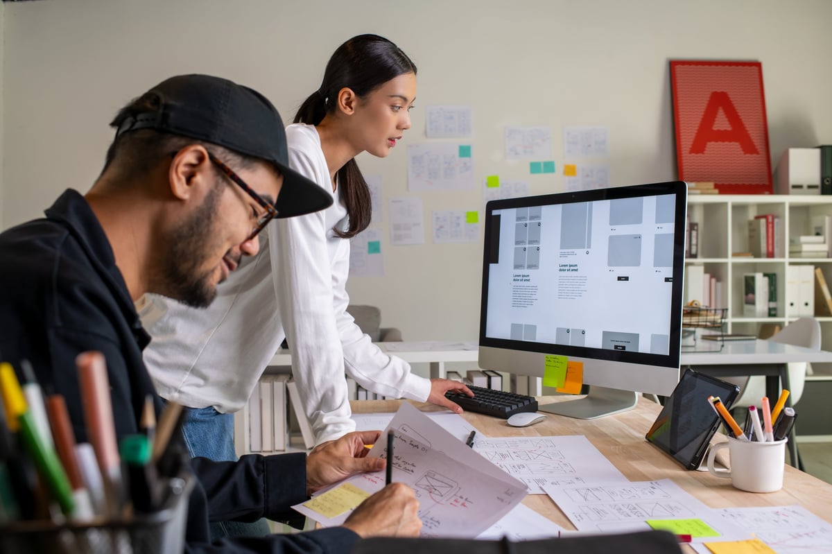 Web design professionals collaborating on website projects